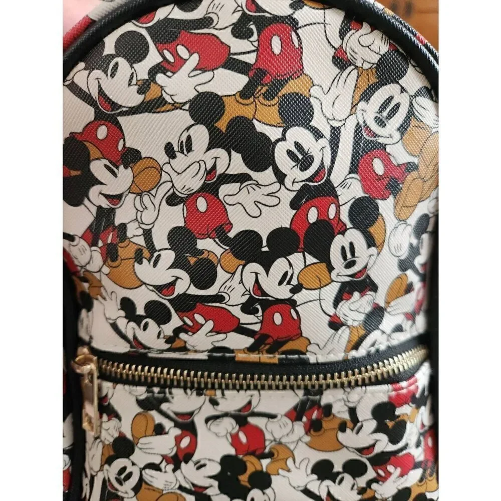 Disney Mickey Mouse backpack and matching card holder. Exterior zippered pocket